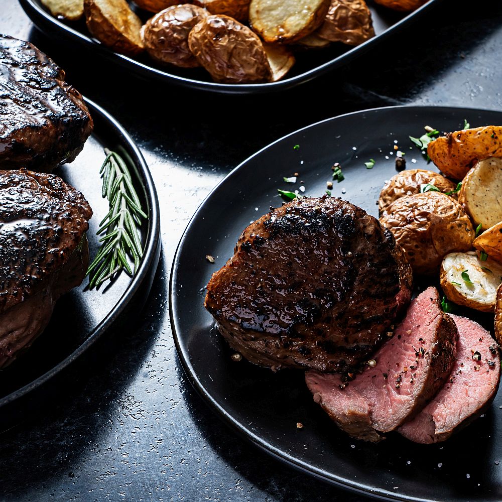 Seared Beef Petite Tender on plate with potatoes