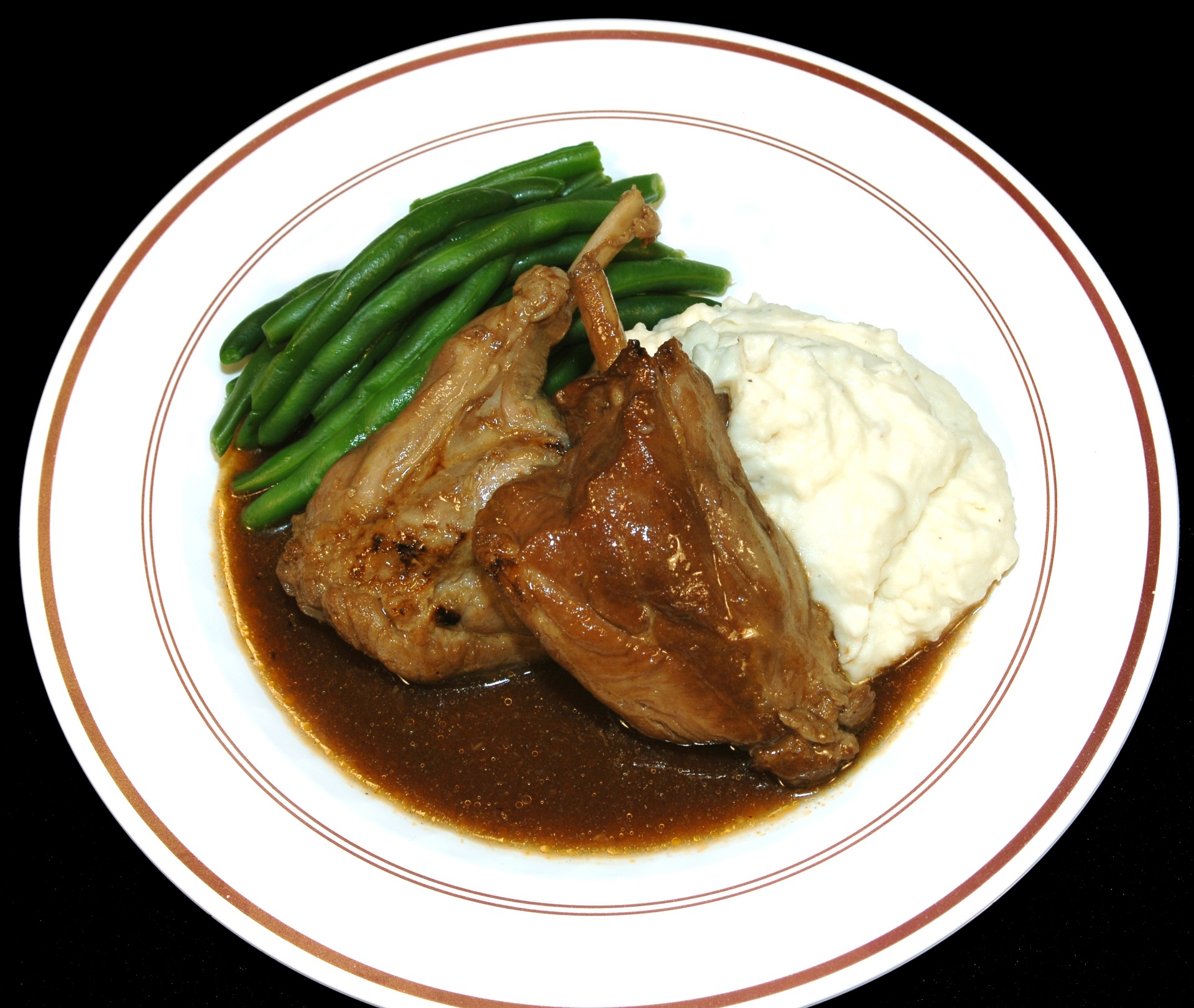 Bordelaise Sauce over meat, mashed potatoes and beans plate