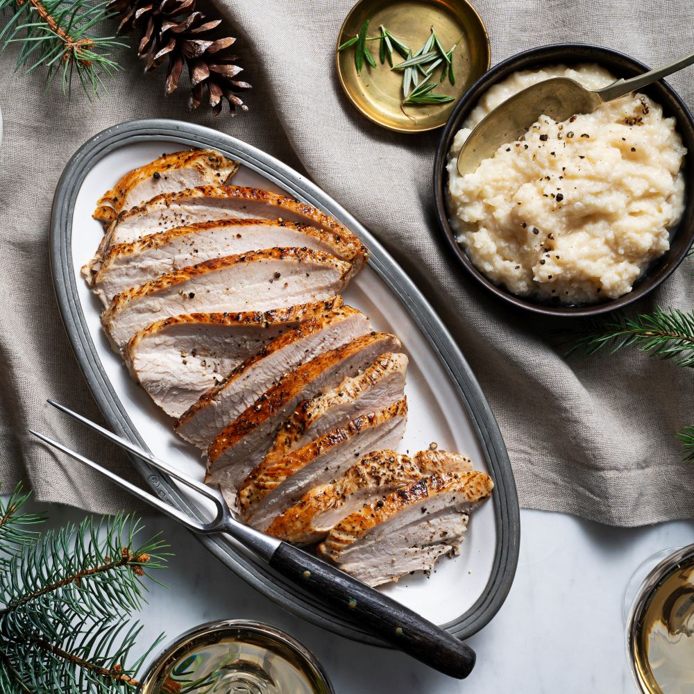 sliced Roasted Turkey Breast on metal serving tray