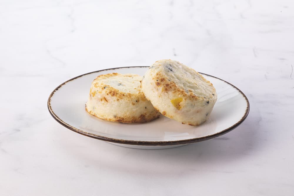 egg bites stacked on plate